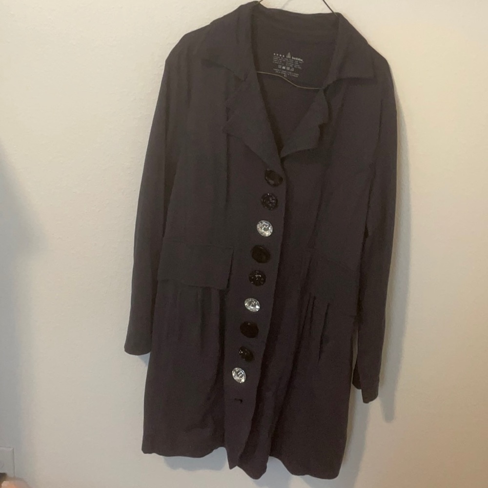 neon buddha trench coat